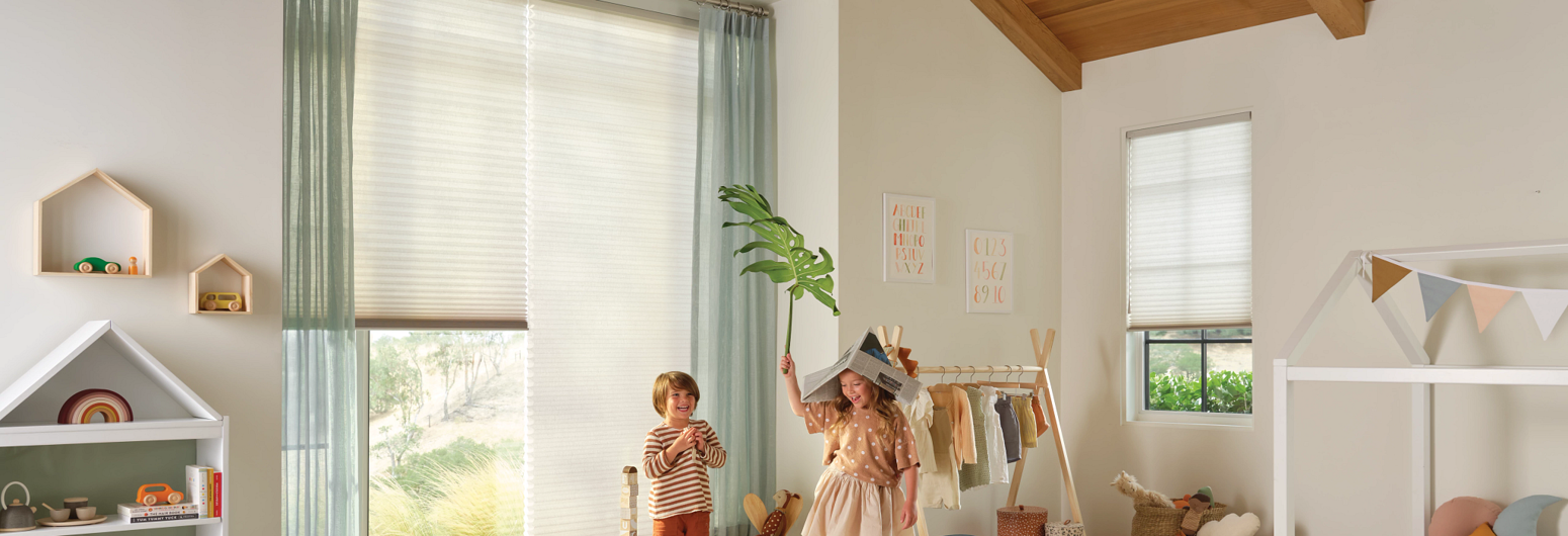 a young boy and girl playing in a child's room | Gotcha Covered