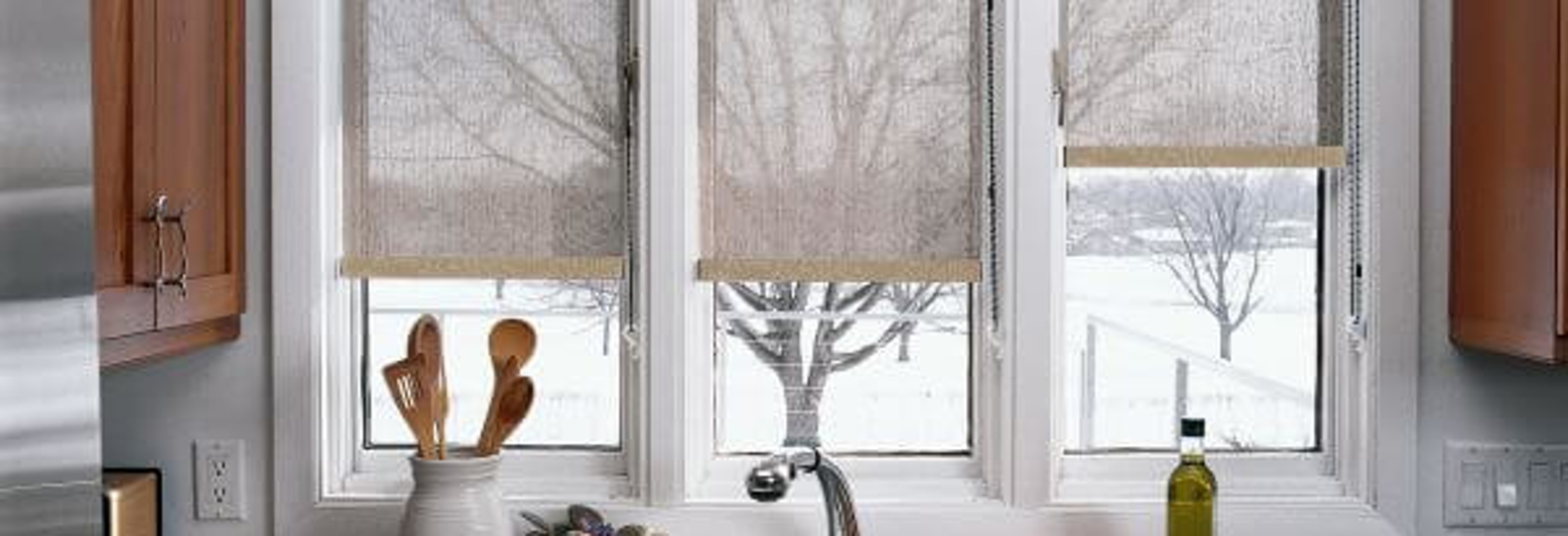 Over-the-sink window with roller shades