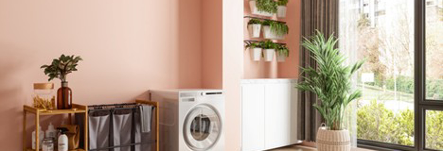 Laundry room interior with washer and dryer | Gotcha Covered