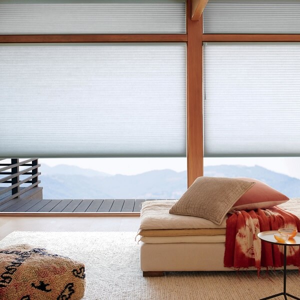 Window treatments are one of the best ways to prevent energy loss through glass window panes to make a home more energy efficient.