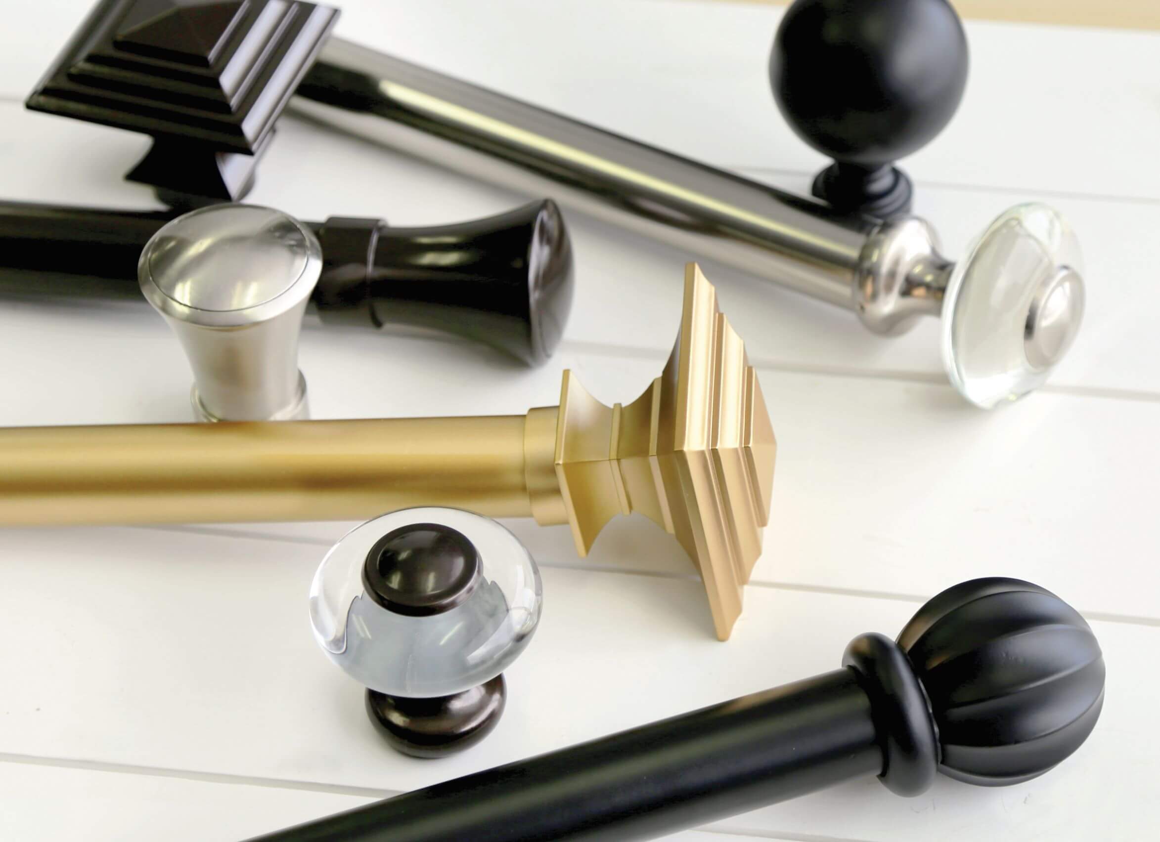 Finials are the pieces that attach to the ends of the curtain rod to add a decorative finish and keep everything in place. 