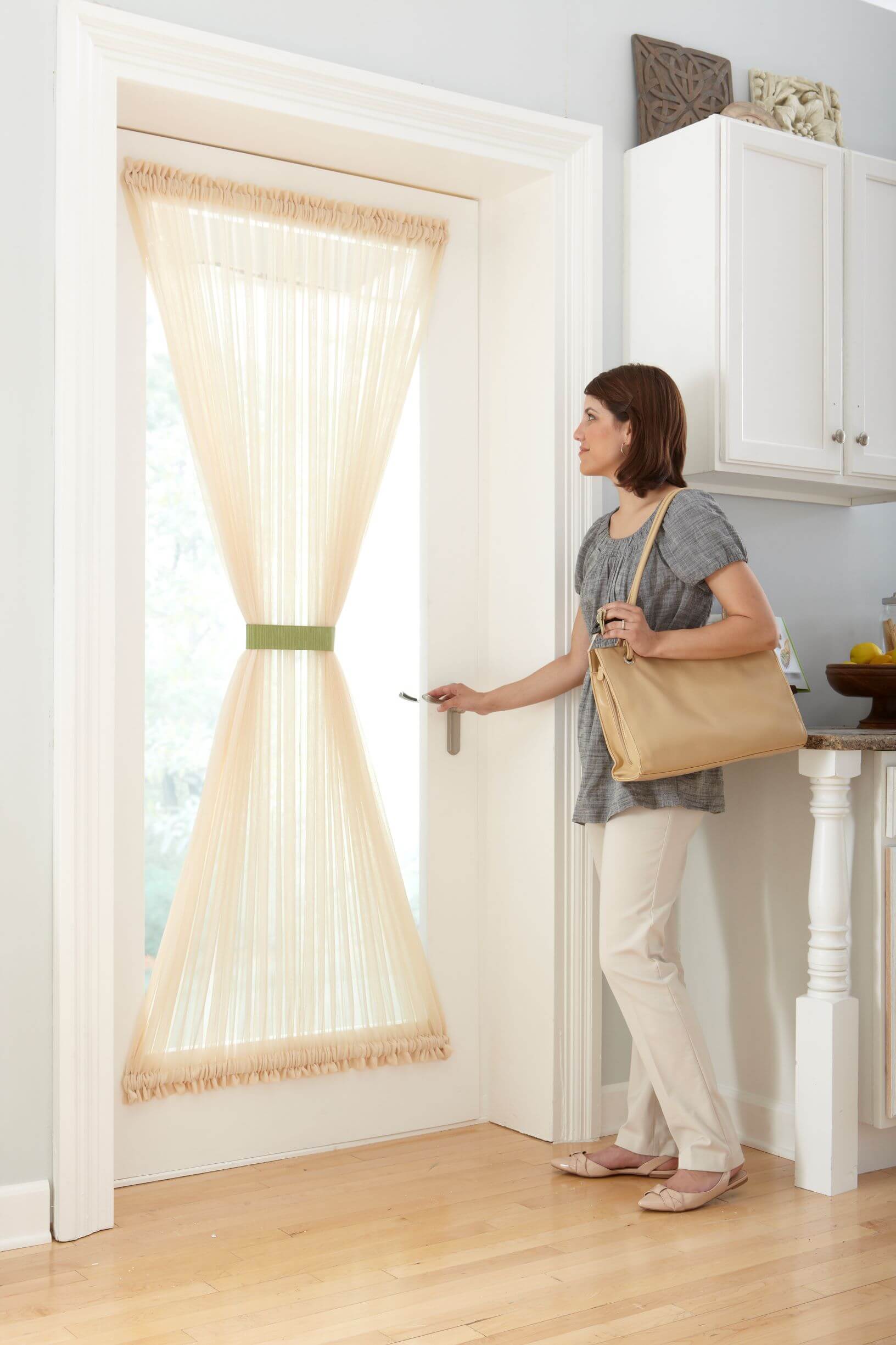 Sash curtains are window treatments that are hung between two rods and pulled tight over a window. 